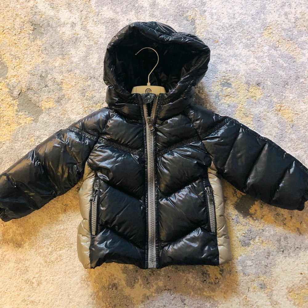 Like new! Baby Moncler, navy blue with red, white and grey accents.